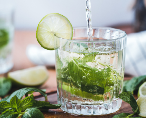 Making your own seltzer with mint and lime